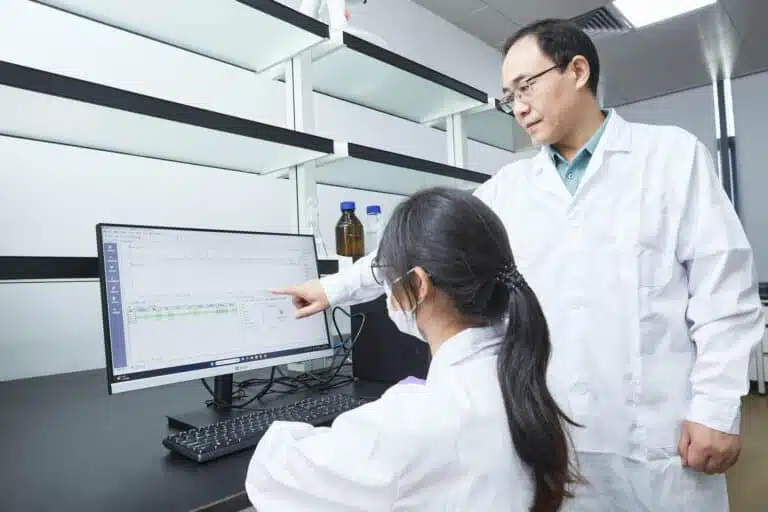 BIORLAB experts analyzing compounds data